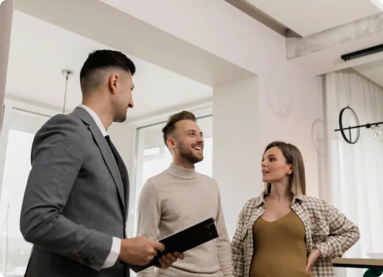 Agent giving a house tour to Future Home Owners